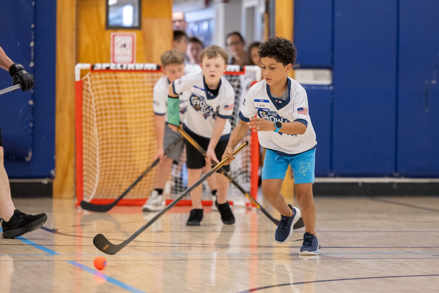 Player driving to the net during an ECBH scrimmage