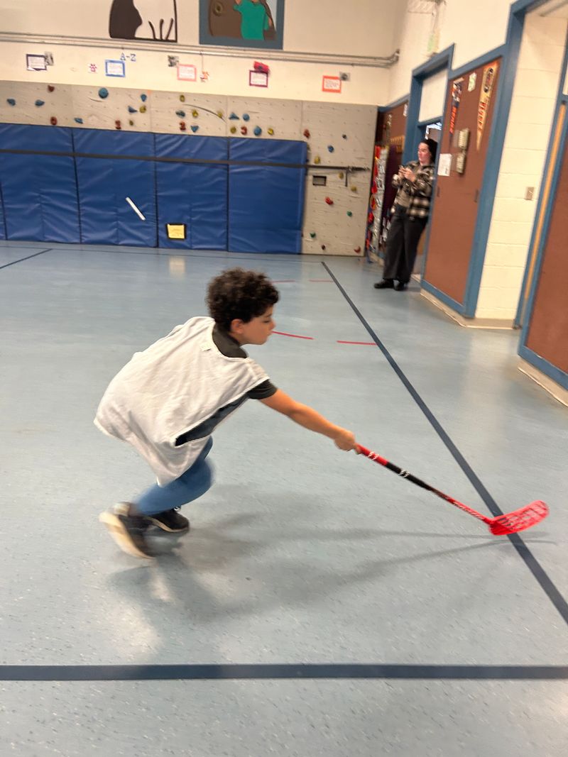 Ball hockey action at Beverly Elementary