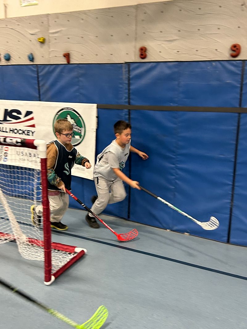Ball hockey action at Beverly Elementary