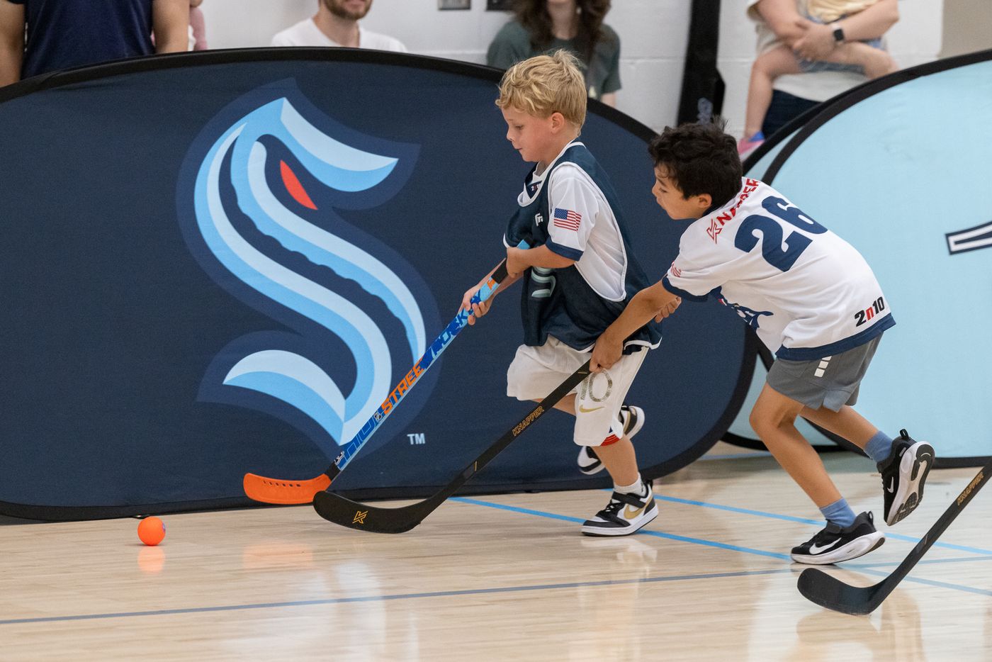 Our youngest ball hockey players battling for the ball at Grow the Game Day