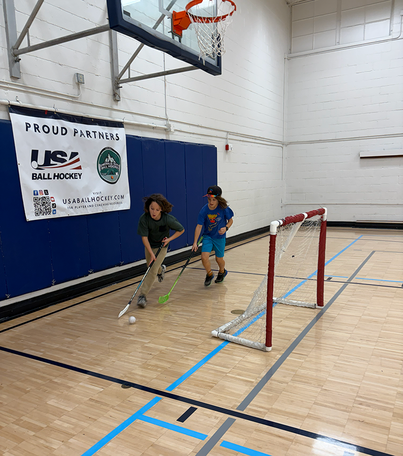 Kids playing ball hockey at Edmonds program